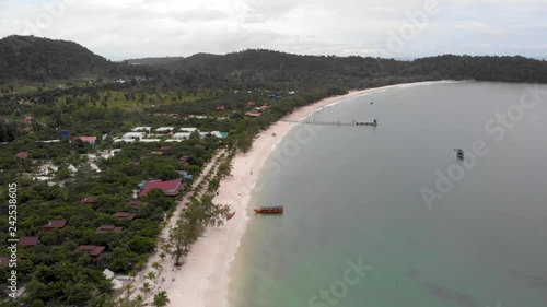 Beautiful white sand beach and green vegetation from above, drone shot of Long Beach in Koh Rong Island, Cambodia photo