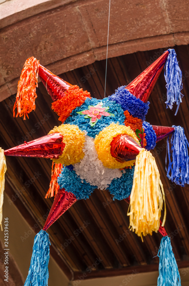 Traditional colorful pinata star shape from mexico. Important part of  parties and celebrations in mexican culture, very popular during posadas  and parties Stock Photo | Adobe Stock