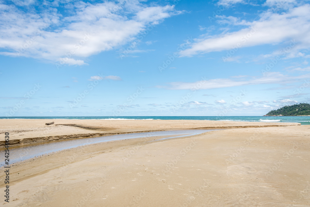Desert and calm beach at the Campeche, Florianopolis, Brazil.