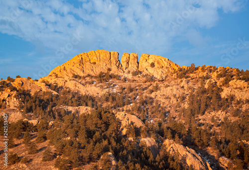 Horsetooth rock formation at sunrise is a distinctive geological and popular mountain landmark overlooking Fort Collins, Colorado, USA