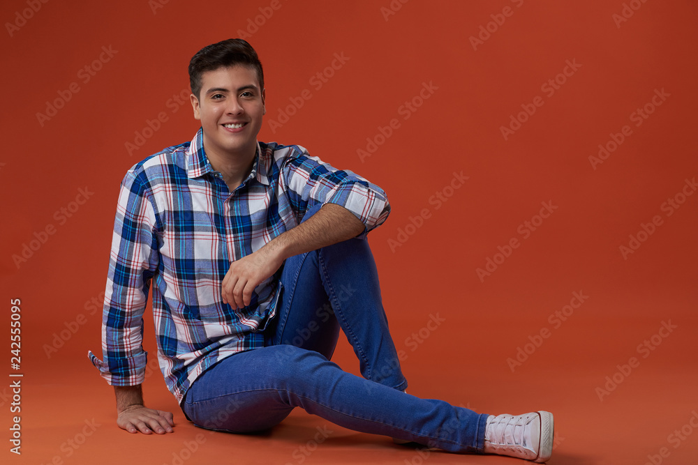 Young man sit on floor Young man sit on floor