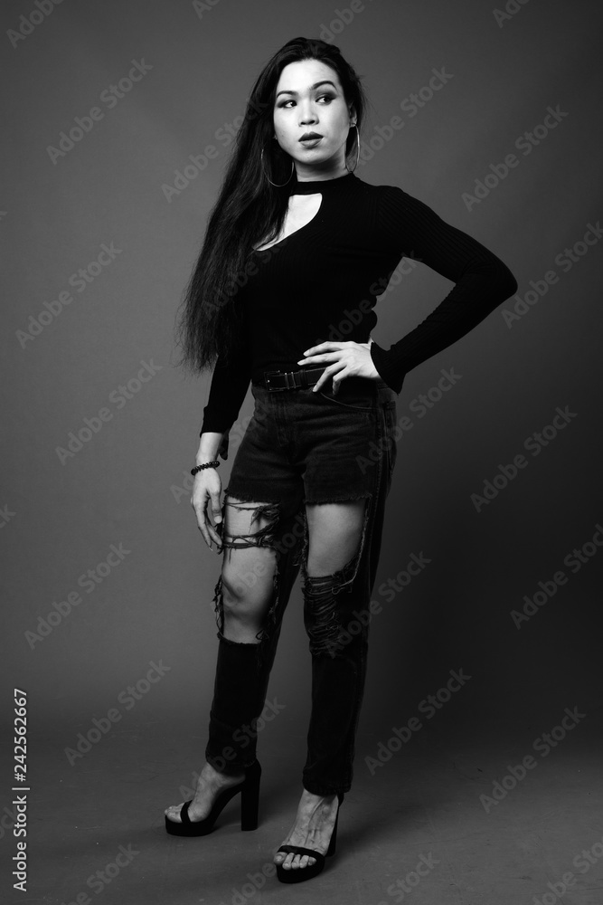 Full length portrait of transgender woman in black and white Full length portrait of transgender woman in black and white