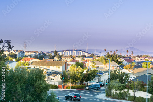 View towards Bayshore Freeway from a residential neighborhood in Foster City at sunset, San Francisco bay area, California photo