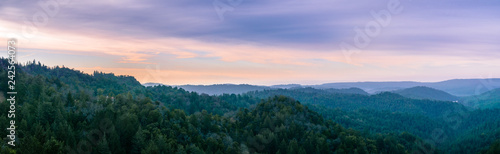 Early morning panorama in Santa Cruz mountains; Monterey bay and the Pacific Ocean visible in the background; San Francisco bay area, California