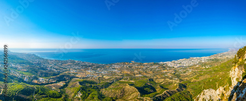 Kyrenia/Girne viewed from St. Hilarion castle in Cyprus photo