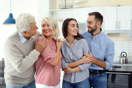 Bild auf Leinwand Happy family at home. Reunion of generations