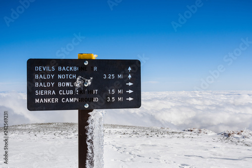 Trail marker and directions on top of Mount San Antonio (Mt Baldy), Los Angeles county, California