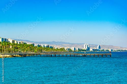 A pier leading to the mediterranean sea in Limassol, Cyprus photo