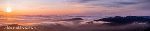 Photography Panoramic view of a sunset over a sea of clouds covering south San Francisco bay