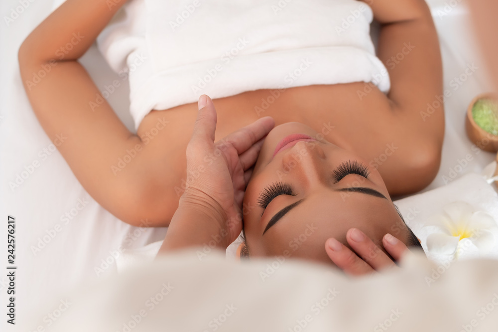 Asian girls are a relaxing facial massage in the Spa Salon. Thai massage for health Asian girls are a relaxing facial massage in the Spa Salon. Thai massage for health