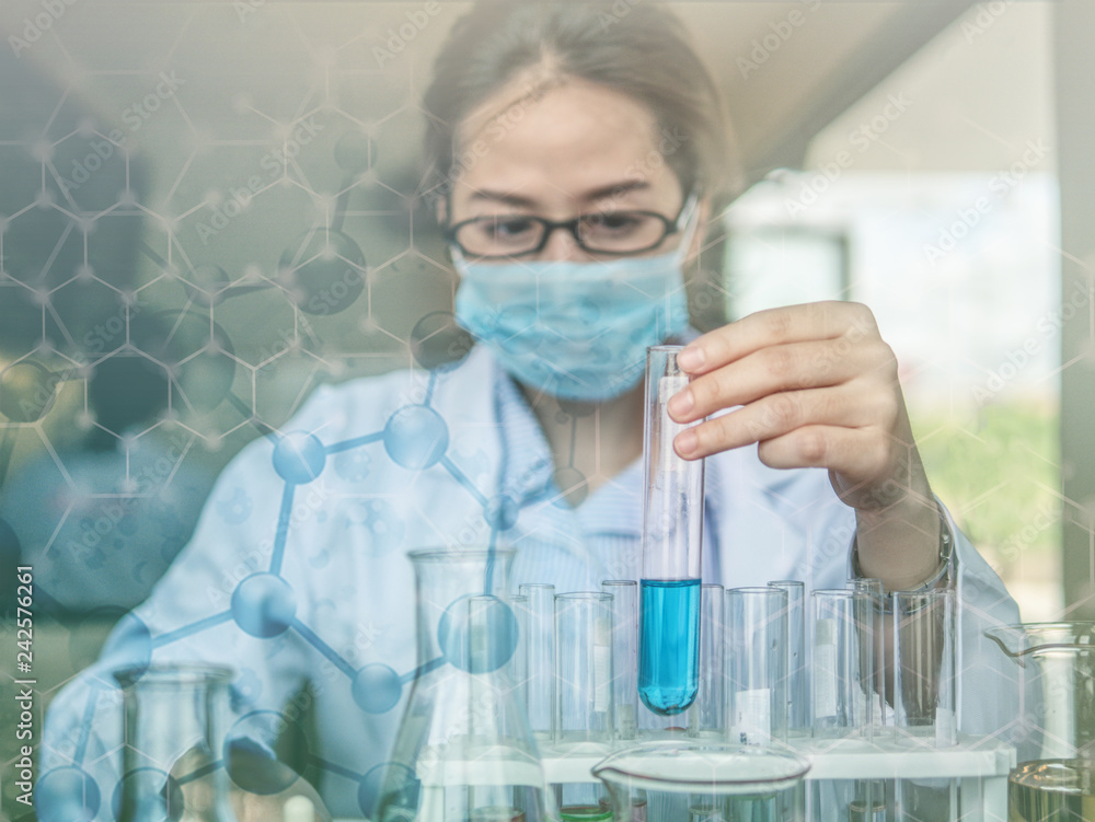 abstract background of female scientist holding test tube abstract background of female scientist holding test tube