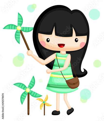 an adorable little girl playing with her windmills
