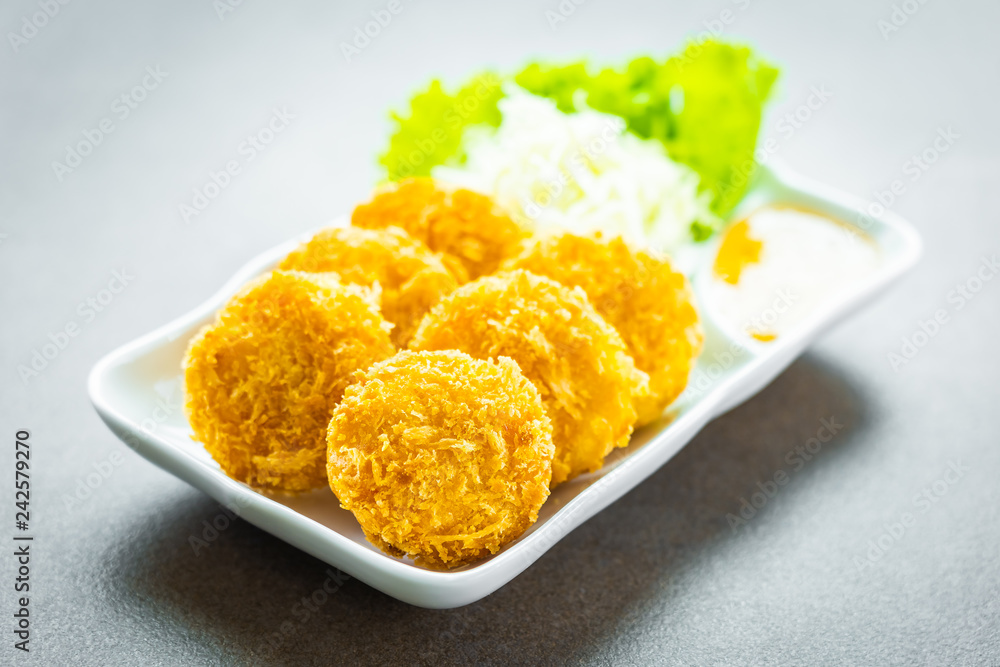 Deep fried shrimp cake or ball with vegetable Deep fried shrimp cake or ball with vegetable