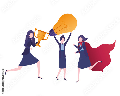 businesswomen with trophy and light bulb