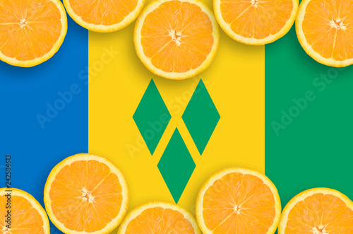 Saint Vincent and the Grenadines flag in citrus fruit slices horizontal frame