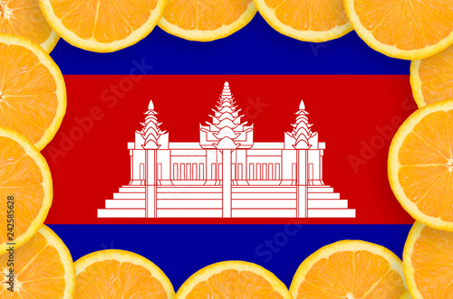 Cambodia flag  in fresh citrus fruit slices frame photo