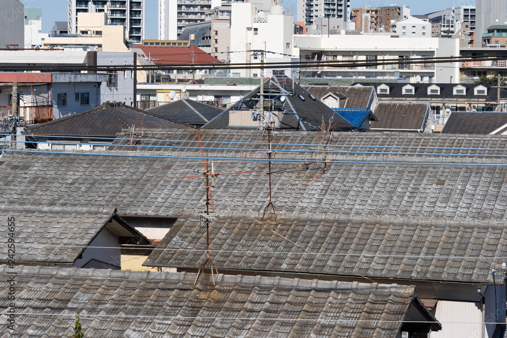 TV antenna on a tiled roof in Fukuoka prefecture, JAPAN.