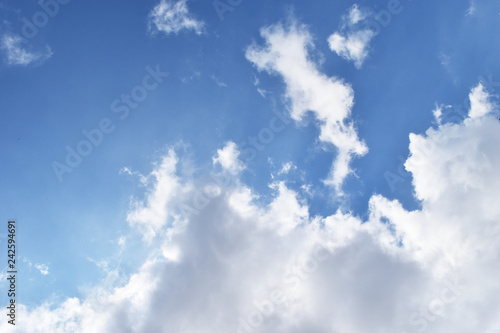 Cumulus cloud on beautiful blue sky , Fluffy clouds formations at tropical zone , Thailand