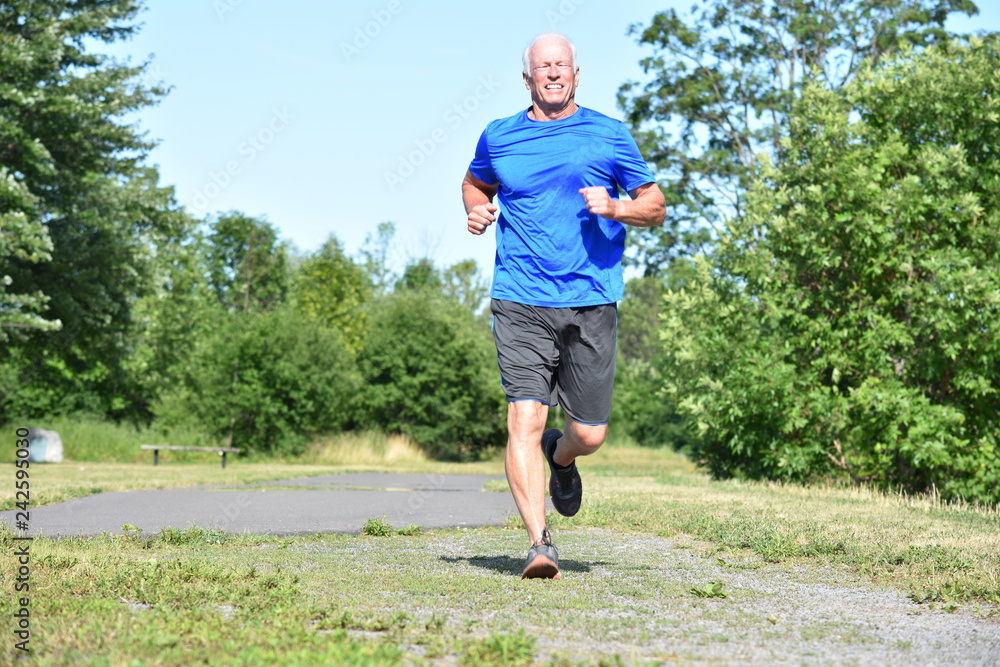 Old Male Senior And Happiness Wearing Sneakers Exercising Old Male Senior And Happiness Wearing Sneakers Exercising