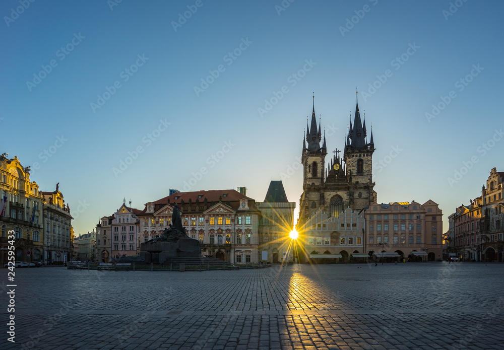 Sunrise in Prague old town square with view of Tyn Church in Czech Republic