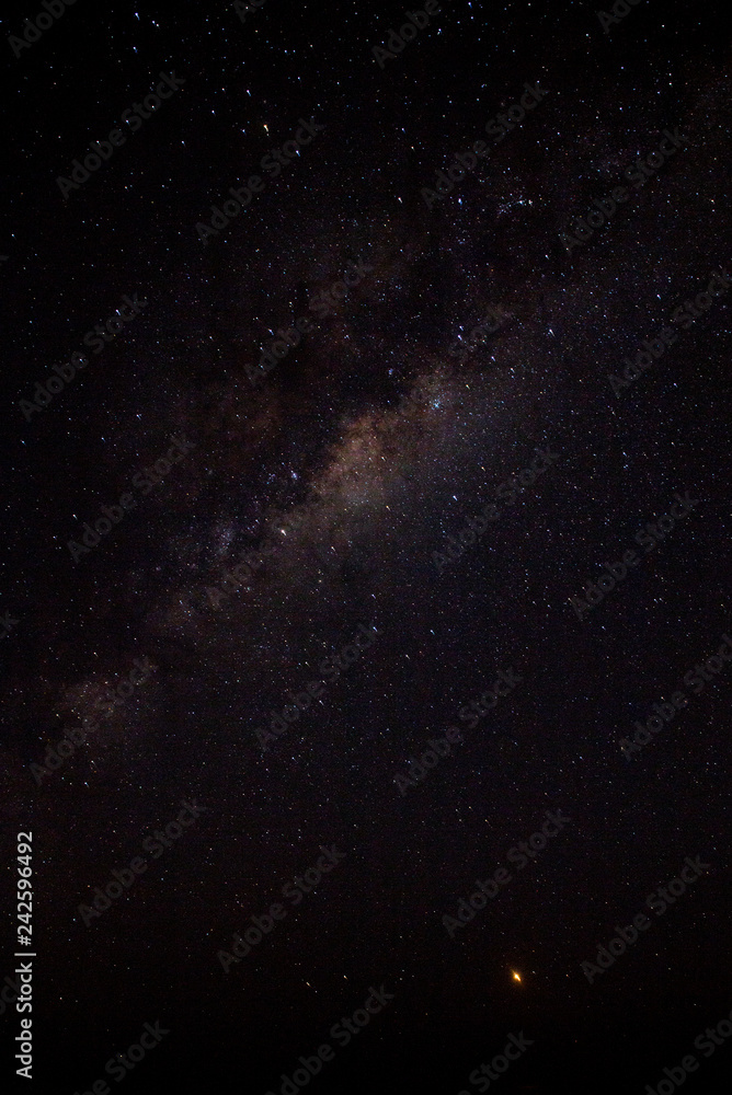 Milky Way. Fantastic night landscape with purple milky way,