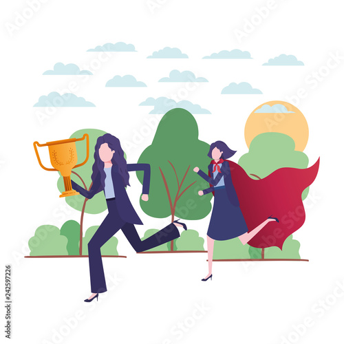 businesswomen with hero coat and trophy