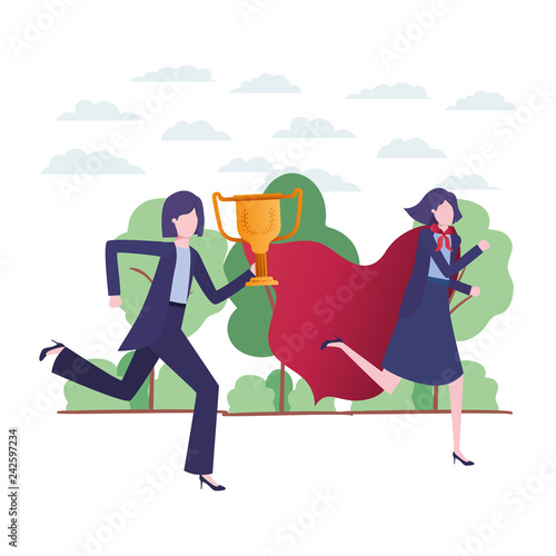 businesswomen with hero coat and trophy