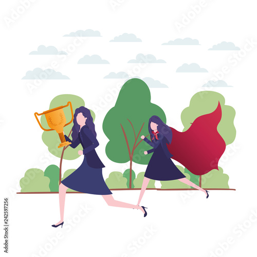 businesswomen with hero coat and trophy