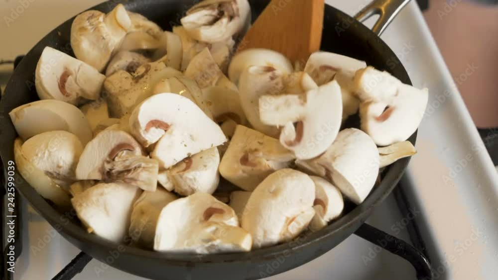 champignon mushroom roasting on pan with onion
champignon mushroom roasting on pan with onion