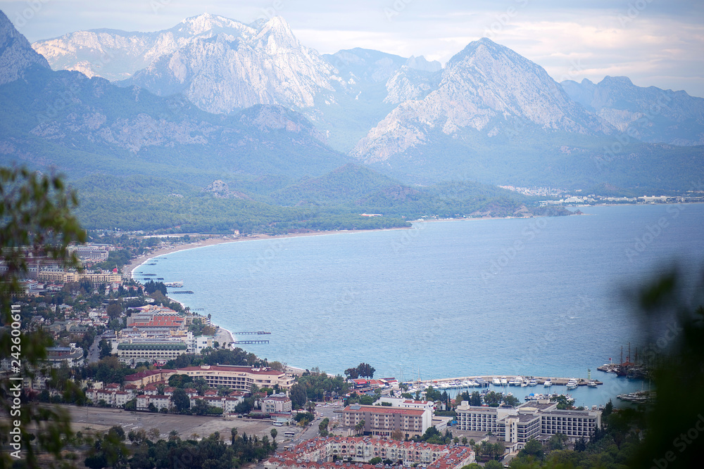 Panoramic view from the mountain of the city of Kemer in Turkey. Mountains, sea, clouds