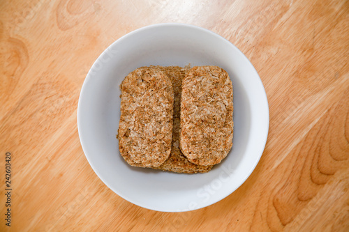 Rectangular wheat biscuits in a bowl © Martin