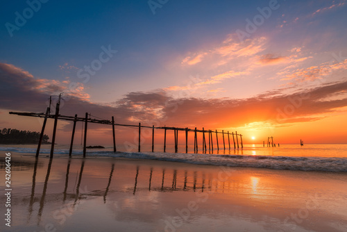 Seascape of Old wooden bridge at sunset time in Phangnga, Thailand.