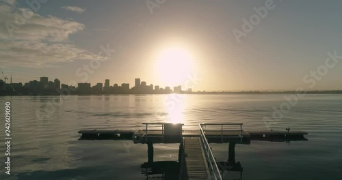 Jetty views with a fly over the Swan River, Perth, Western Australia. photo