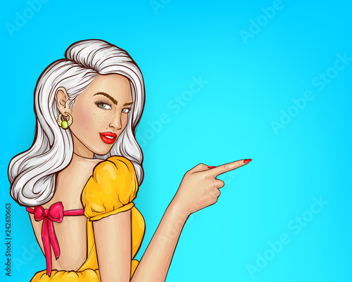 Vector sexy girl in yellow dress points direction with her index finger to sale, a sell-out. Pop art glamor model with freckles, ash blonde. Woman character isolated on blue background