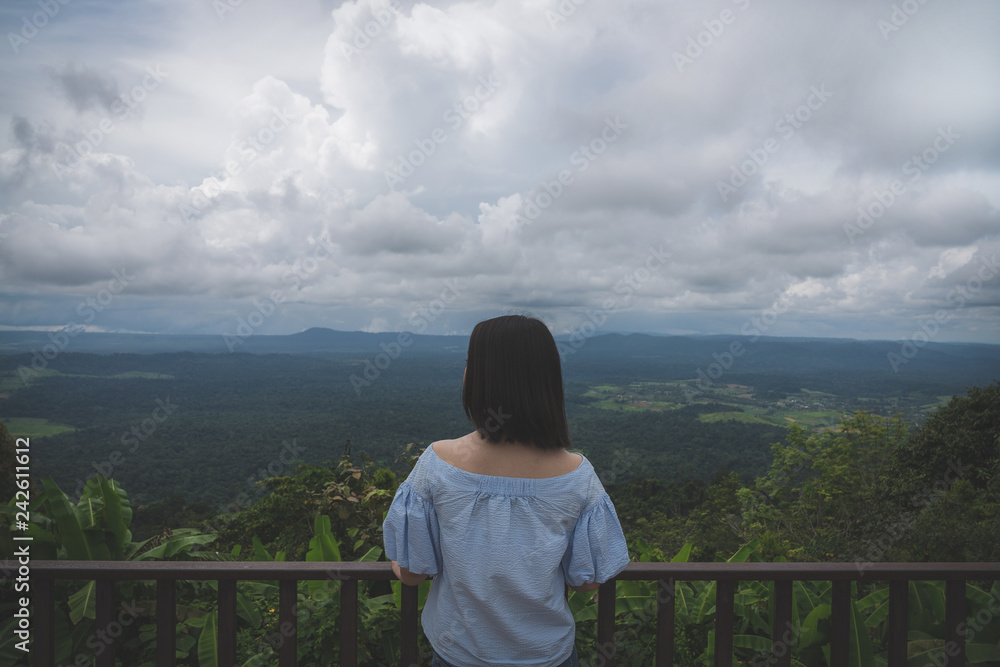 Happy young cute asian Japanese girl hipster backpack women travelling looking at beautiful sky mountains scenery views Happy young cute asian Japanese girl hipster backpack women travelling looking at beautiful sky mountains scenery views