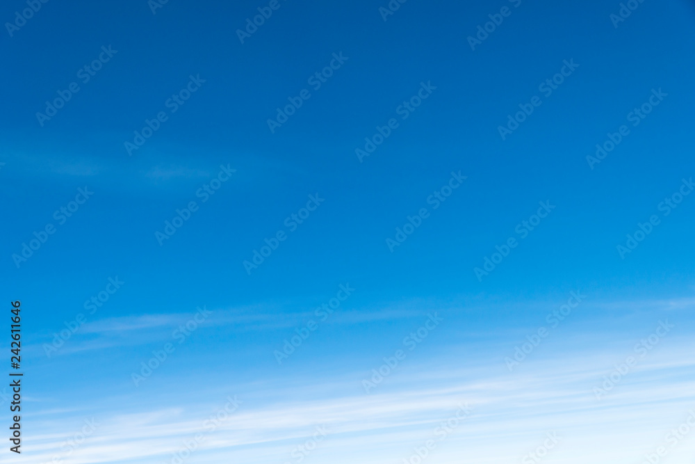Obraz premium Blue sky on a sunshine day with white sea of clouds at the bottom. It is like heaven going along the aviation trip in the cold season in asia.