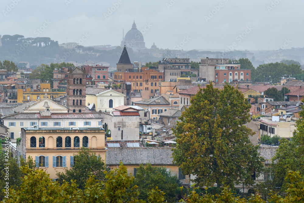 View on Rome from Orange Garden, Giardino degli Aranci on Aventine hill in rain. Italy