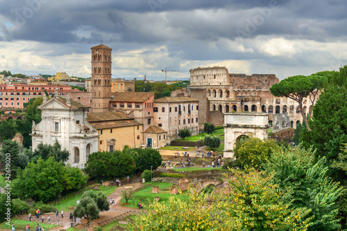 Colosseum and Ruins of Roman Forum. Santa Francesca Romana church, Arch of Titus and others. Rome. Italy