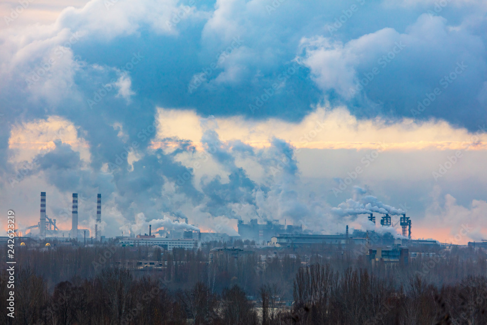 Smoke from pipes at the plant pollutes the environment