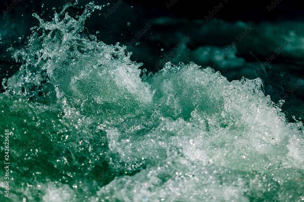 Splashes of water from the waves in the sea