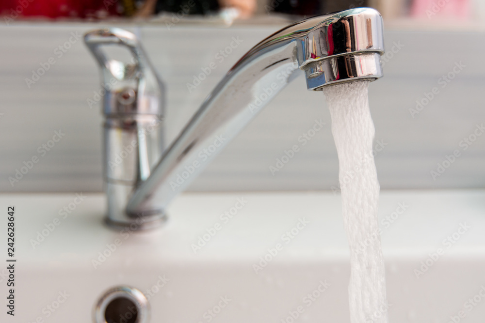 Water pours more pressure from the mixer in the bathroom Water pours more pressure from the mixer in the bathroom