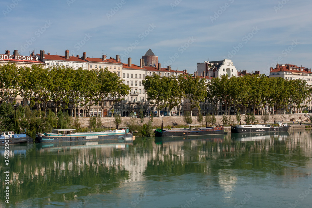 Fototapeta premium Lyon France 12-15-2018. Barge moored on the Rhone river in Lyon 