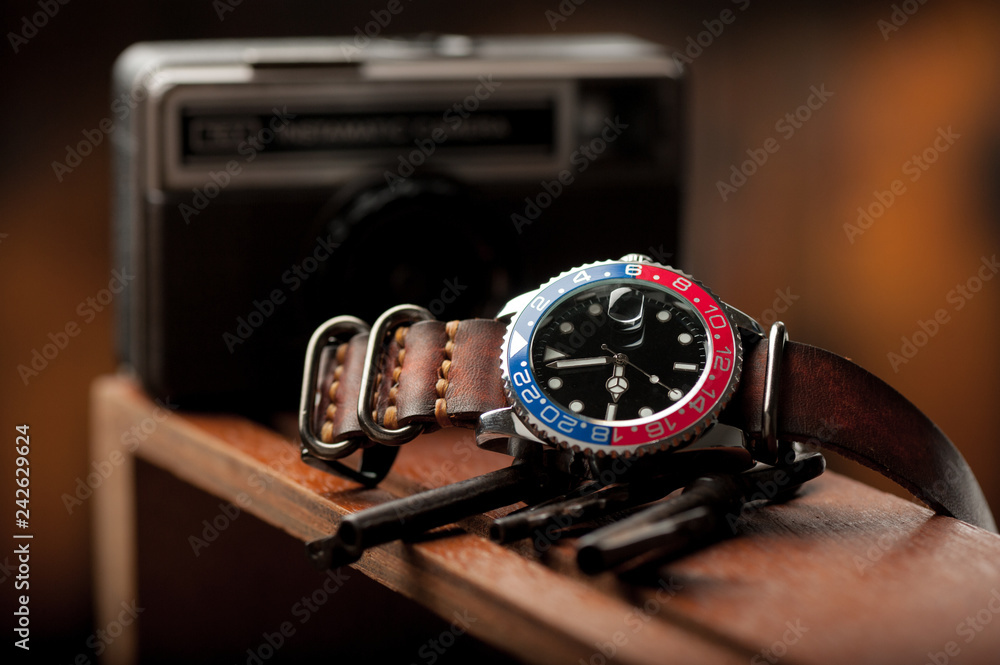 Fototapeta premium men wristwatch with leather strap