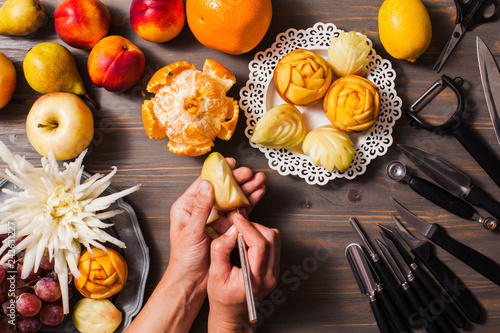 Photography Chinese fruit carving, flat lay hands do it