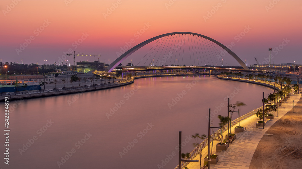 View of the Tolerance Bridge and the Dubai Water Canal during Sunset. 