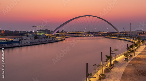 View of the Tolerance Bridge and the Dubai Water Canal during Sunset. 