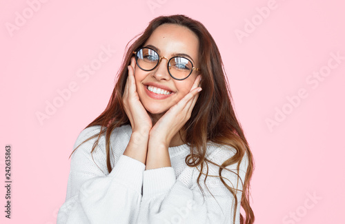 Cute female in glasses smiling