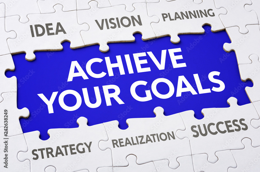 Text on puzzle pieces - Achieve your goals Text on puzzle pieces - Achieve your goals