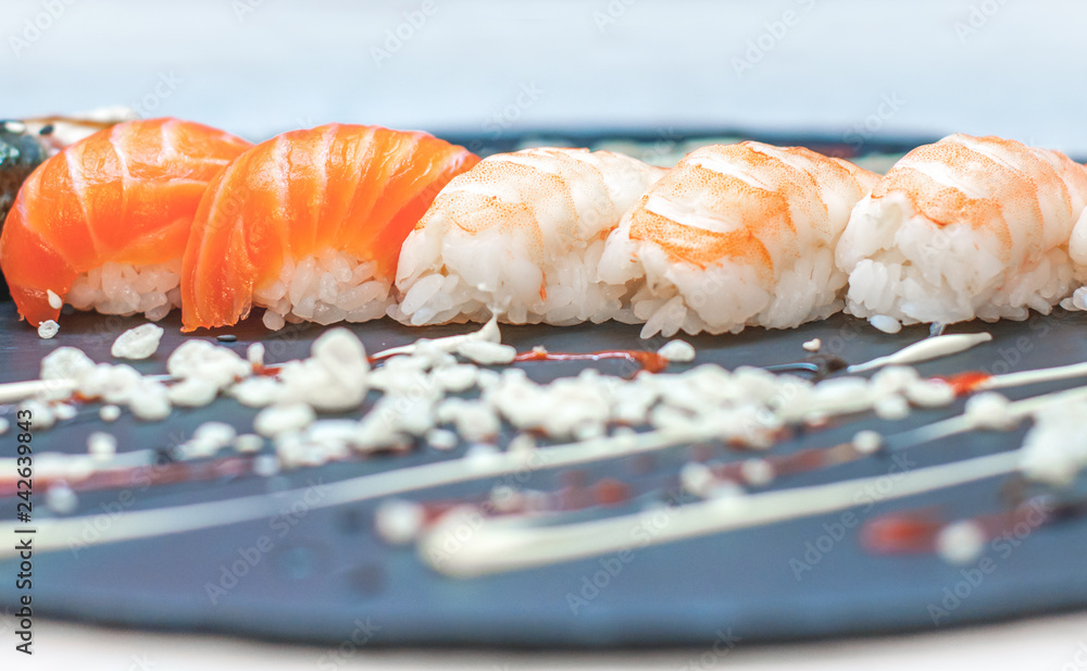 beautiful, bright, sushi sets,as a background, against the backdrop, closeup beautiful, bright, sushi sets,as a background, against the backdrop, closeup