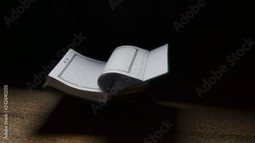 Bible of Muslims' book. Quraan. Kuran. Islamic holy books. photo
